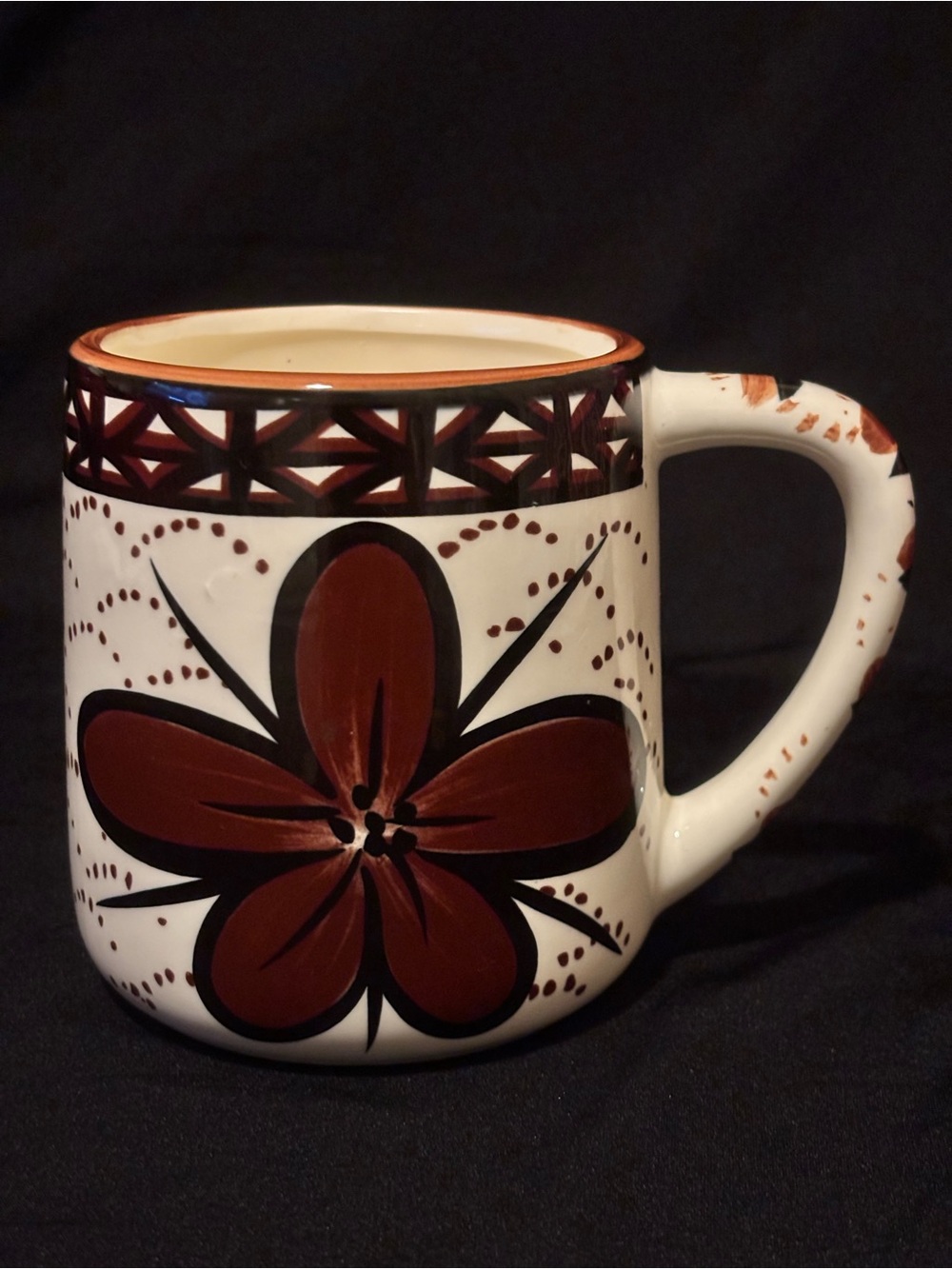 Hand-painted brown floral ceramic coffee mug